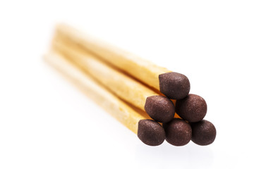 Pyramid matches isolated on white background