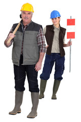 Foreman and female construction worker