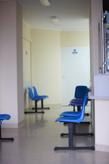 waiting room blue chairs door