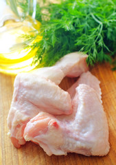 Raw chicken on wooden board, Chicken Wings