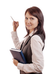 Business woman with diary, shows with a pen somewhere