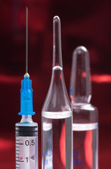 Disposable syringes and ampules