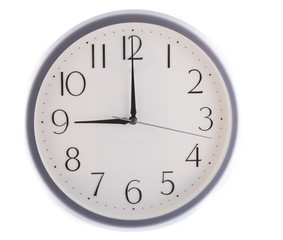 isolated white clock at nine
