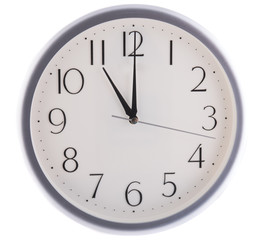 isolated white clock at eleven