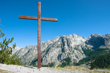 Rusty Crucifix And Albanian Mountains