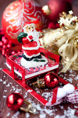 Santa claus on red sleigh. Christmas composition.