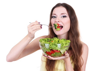 Beautiful woman with vegetable salad isolated on white