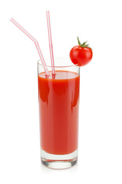 Tomato juice in a glass with drinking straw