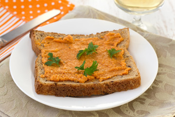 toast with salmon spread and parsley on the plate