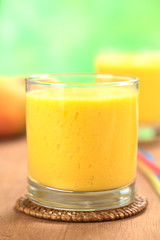 Fresh homemade mango juice in glass