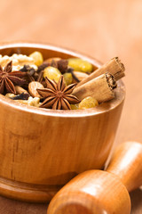 Baking ingredients in wooden mortar