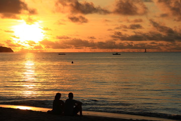 Plakat Romantyczny zachód słońca na brzegu