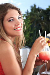 fresh portrait of an amazing girl that drink a cocktail © Omar