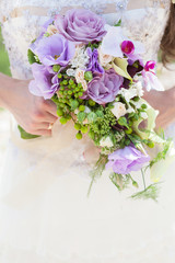 Bride with bouquet, closeup