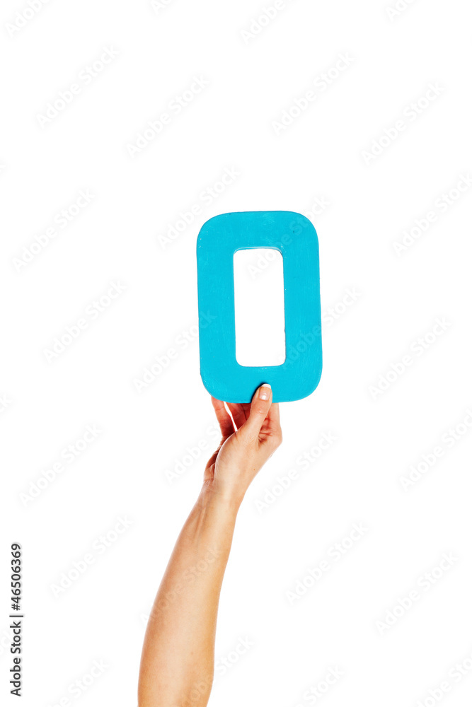 Fototapete hand holding up the number zero from the bottom;