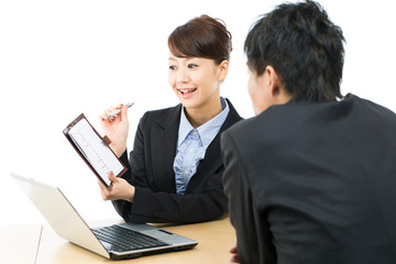 Young asian smiling businesswoman and businessman 