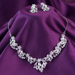 silver necklace with gemstones