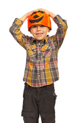Cheerful boy with pumpkin hat