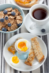 healthy breakfast with egg and cornflakes