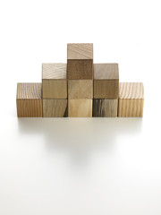 Obraz premium various wooden cubes on a white background