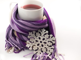 hot tea wrapped in the purple scarf