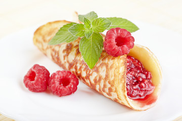 Pancake with raspberry jam