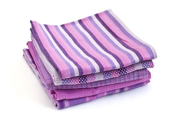 Colorful kitchen towels isolated on white background