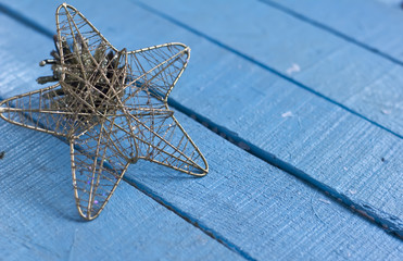 Decorative christmas composition on blue wooden background. Sele