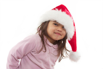 enfant souriante avec bonnet de noël