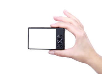 Hand holds digital camera