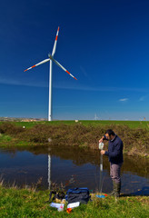 A scientist measuring water quality