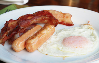 Sausages, bacon and fried egg.