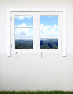 window with mountain and sky view