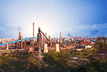 Fototapeta premium Landscape of construction power factories with big chimneys and