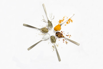 Spices and herbs on white background