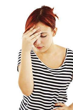 Girl with headache on white background