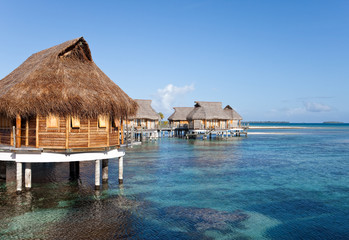 Polynesian landscape -  small houses on water