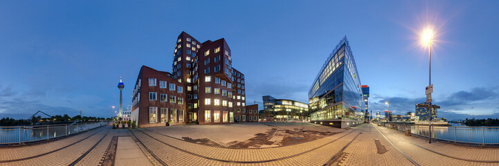 Düsseldorf at dusk. 360 degree panoramic composition.