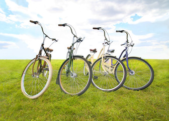 Fototapeta na wymiar four bicycles on meadow