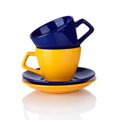 Set of colorful cups pyramid isolated on white background