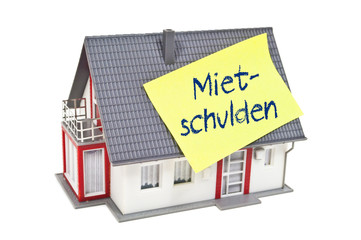 Hausmodell mit Mietschulden
