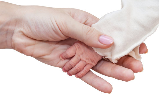 Baby and mothers hands