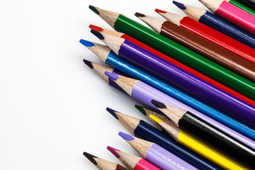 Colour pencils isolated on white background close up