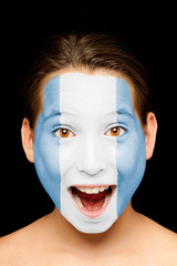 girl with guatemalan flag on her face