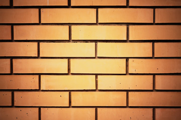 Brick wall in brown tones