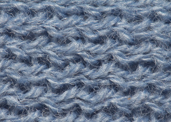 closeup of seamless blue knitted fabric texture