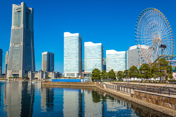 Buildings at Minato-Mirai Yokohama reflected in the river.