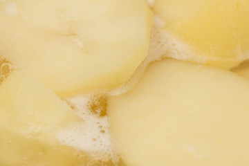 potatoes cooked in the background. macro