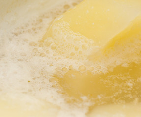 potatoes cooked in the background. macro