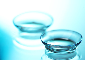 contact lens on blue background